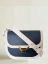 KABELKA COCCINELLE DEW BICOLOR midnight/blanco