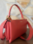 KABELKA COCCINELLE ARLETTIS MEDIUM grenadine red