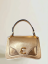Coccinelle C-Me Calf kabelka Small – gold