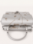 Coccinelle Arlettis Shadow Print crossbody kabelka – silver