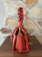 Coccinelle Boheme Ostrich Small – grenadine red